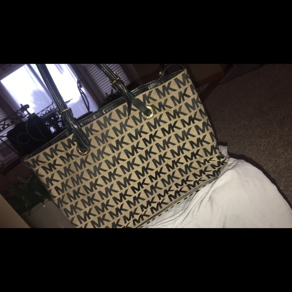 MK monogrammed cloth bag